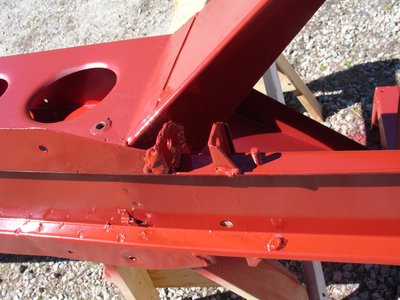ugly welded control arm mount repaint.JPG and 
